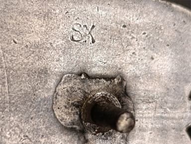 Sygnatura średniej odznaki litery SX