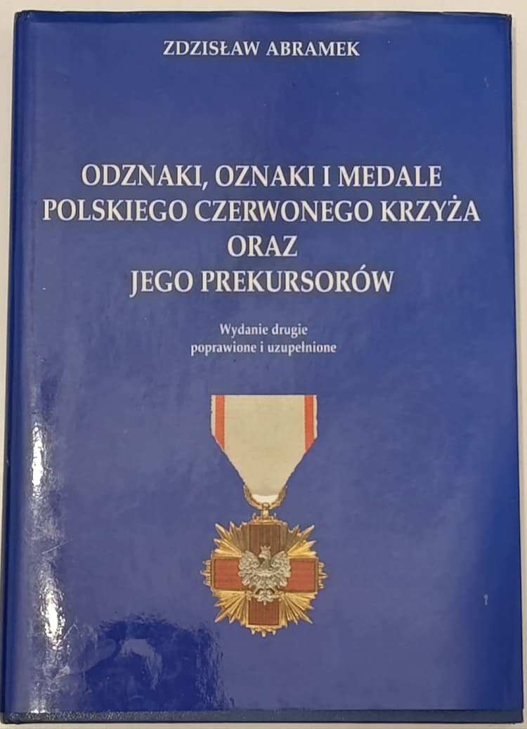 Okładka książki, oznaki i medale polskiego czerwonego krzyża oraz jego prekursorów